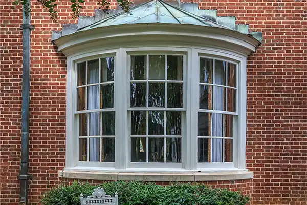 An oriel bay window on an upper floor