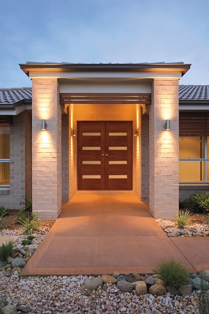 A welcoming front entry door with glass accents