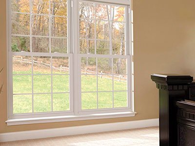 Home exterior with Simonton windows and an entry door