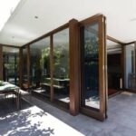 Sleek patio doors with dark windows and dark trim