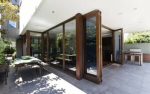 Sleek patio doors with dark windows and dark trim
